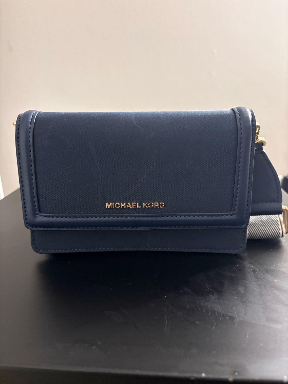 Michael Kors navy leather crossbody wallet with gold logo